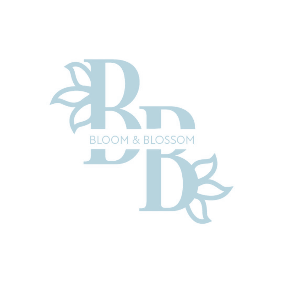 Bloom and Blossom monogram logo in soft blue with floral details