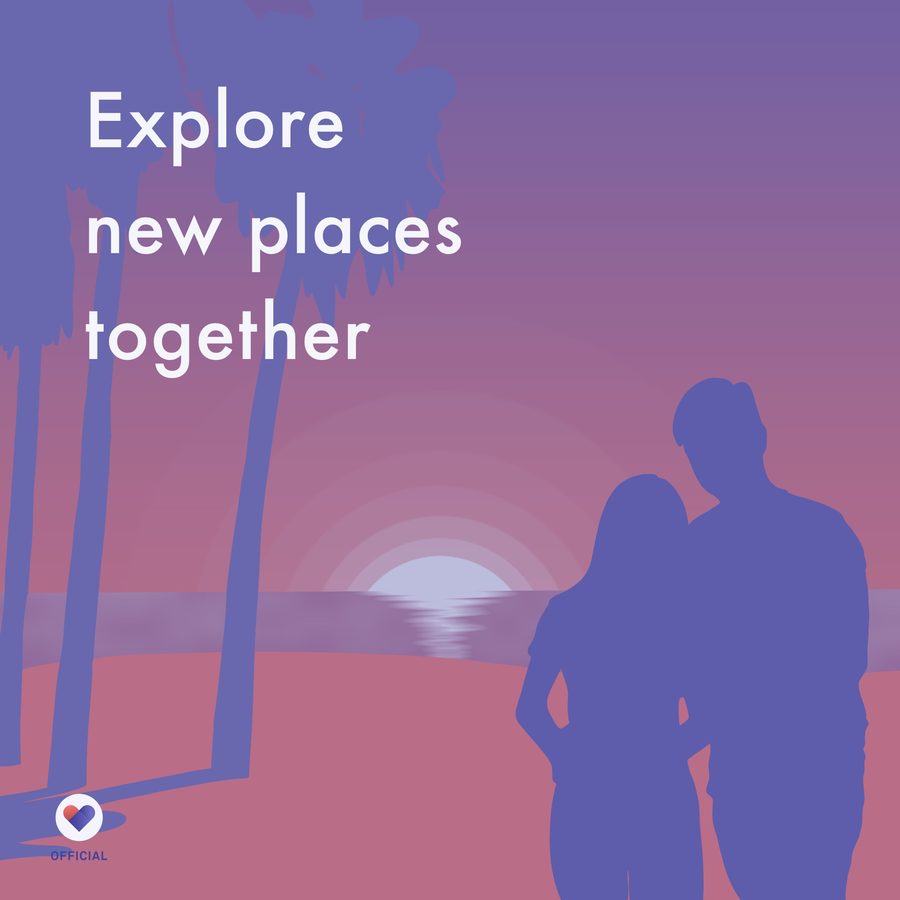Silhouetted couple at sunset on a beach